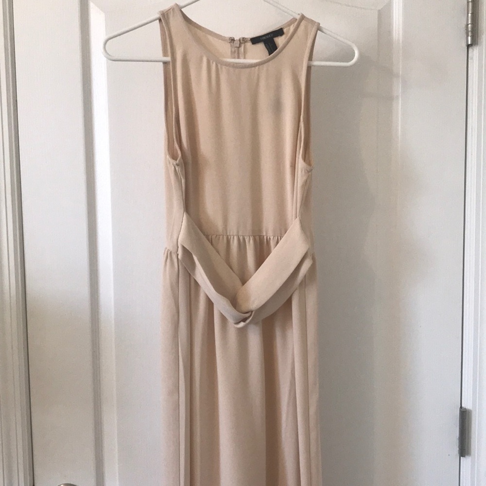 Beige floor length dress with knot detail